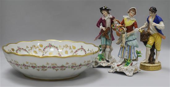 Three figurines and a large bowl